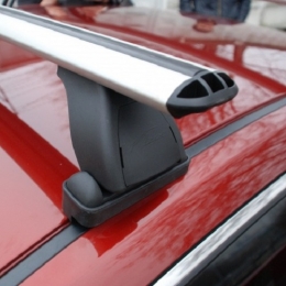Багажник на крышу автомобиля Lux аэродинамическая дуга в штатные места